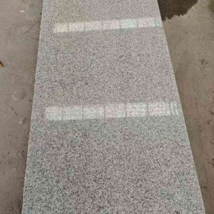 乌海芝麻白光面毛板